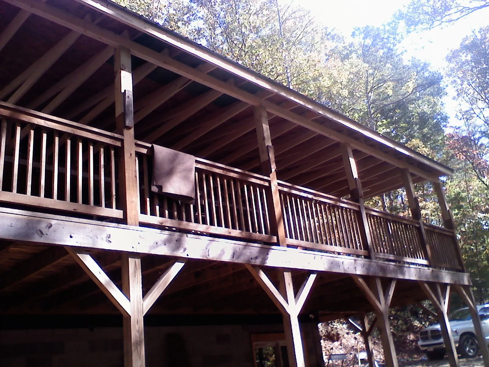 Timber framing under a new elevated porch and deck — Roof Leak Repair in Weed by Roofing Brothers